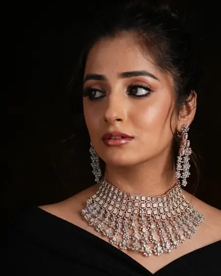 A diamond choker and drop earrings from ARA Jewellers